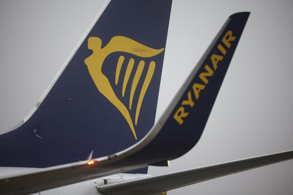 The Ryanair logo appears on a Boeing 737-8AS aircraft, registration SP-RSP, at Warsaw-Modlin Airport in Modlin