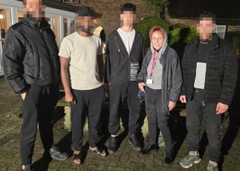 The Brasserie restaurant at the Copthorne Hotel was once a much-loved family venue. Yet today, it is no longer open to the public after the hotel, just three miles from Gatwick in West Sussex, became migrant accommodation in 2021. Pictured: Sue Reid with a group of migrants living in the hotel, who invited her to tour it