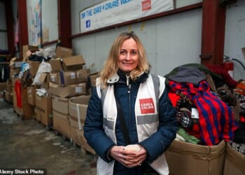 Clare Moseley, founder of Care4Calais, in their warehouse near Calais in France. The middle-class mother appears to have morphed into a highly organised political force