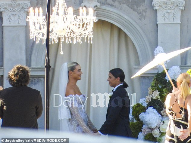 Sam Kerr (right) and Kristie Mewis (left) have tied the knot in a glamorous ceremony in Perth, with big names from the world of women's football all arriving to celebrate their big day