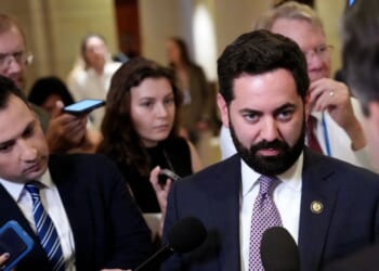 Rep. Mike Lawler speaks to reporters as he arrives for a House Republican Caucus meeting at the U.S. Capitol on May 15, 2025, in Washington, D.C.