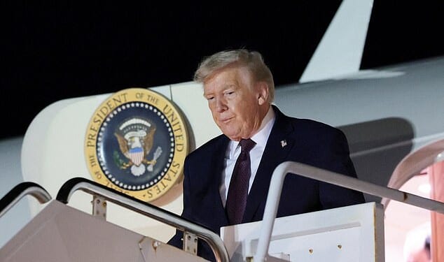President Donald Trump remained silent about the release of thousands of photos related to convicted pedophile Jeffery Epstein while speaking at a Friday night rally. Pictured: Trump getting off a plane at West Palm Beach International Airport to head to his Mar-a-Lago resort