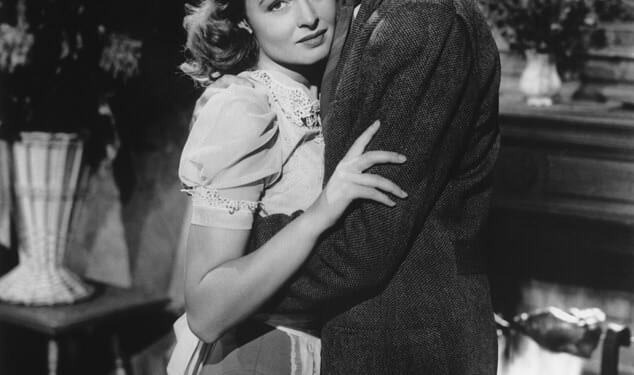 James Stewart embracing Donna Reed from the 1946 Frank Capra film 'It's a Wonderful Life'
