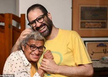 Alaa Abd El-Fattah with his mother Laila after arriving back in the UK