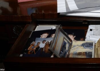 The missing files, which were available Friday, contained a photo of Trump, alongside Jeffrey Epstein, Melania Trump and Epstein's longtime associate Ghislaine Maxwell