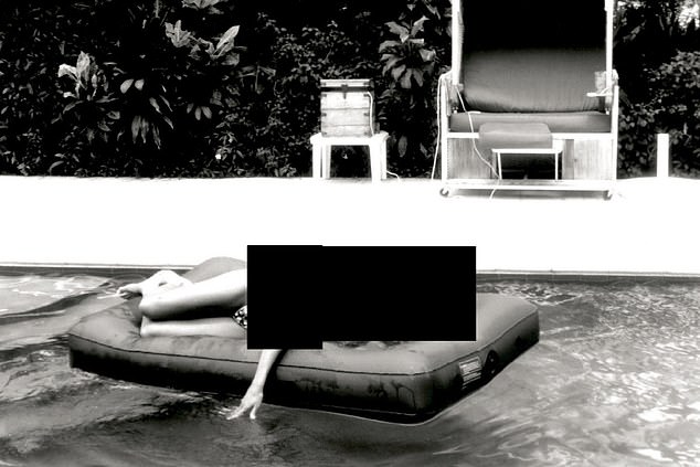 Pictured is an unidentified woman lounging on a pool float