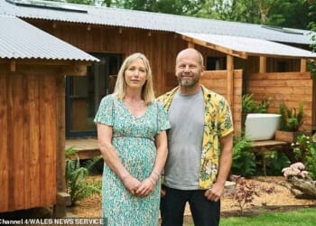 Former BBC journalist Abigail Beck, 47, and designer Marcus Beck, 50, outside their eco-friendly house