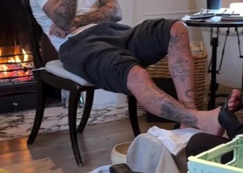 Victoria Beckham, 51, captured her husband David, 50 (pictured) getting a home pedicure on Instagram on Wednesday as the family put on a brave face on after Brooklyn blocked them
