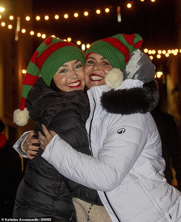 Sisters Lisi and Aura from Gran Canaria celebrate Hogmanay in Edinburgh, Scotland