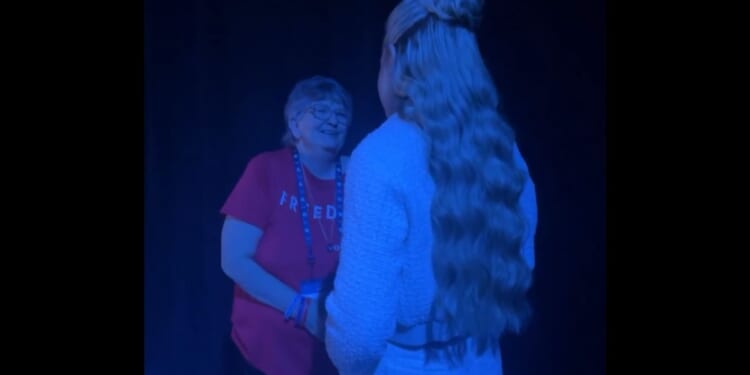 This X screen shot shows Erika Kirk greeting Jeanie Beeman at Turning Point USA's Americafest 2025 event.