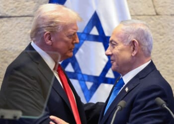 President Donald Trump speaks with Israeli Prime Minister Benjamin Netanyahu at the Israeli parliament, the Knesset, in Jerusalem on Oct. 13, 2025.