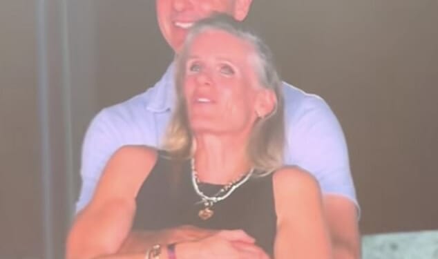 Andrew Byron, the head of the AI startup Astronomer, was broadcast on the big screen at Boston's Gillette Stadium with his arm around the company's HR chief Kristin Cabot