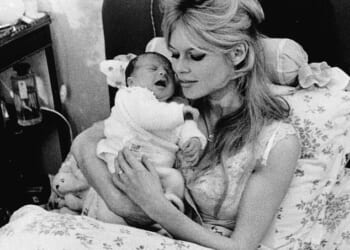 Brigitte Bardot made her estranged son Nicolas-Jacques Charrier a promise before her death after admitting she'd rather 'give birth to a dog' (pictured with her son in 1960)