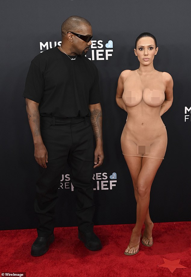Kanye West's wife Bianca Censori shocked fans with her controversial naked outfit stunt on the red carpet at the Grammy Awards on February 2