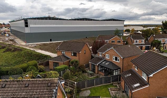 Aerial images show the effects of the 'monstrous' warehouses on neighbours, where cladding installed is now blocking light and creating darkness