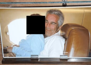Jeffrey Epstein is pictured with an unnamed girl. The image was released by the DOJ