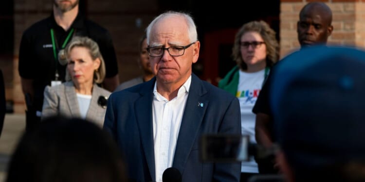 Minnesota Gov. Tim Walz speaks to journalists at Deerwood Elementary in Eagan, Minnesota, on Sept. 2, 2025.