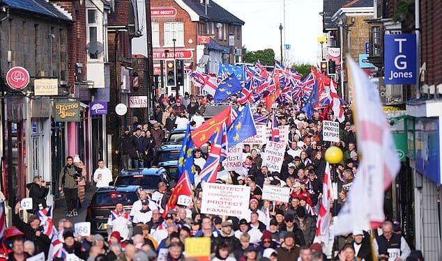 Around 4,000 marched through Crowborough, East Sussex, on Sunday to protest against Home Office plans to host asylum seekers at the nearby Army base