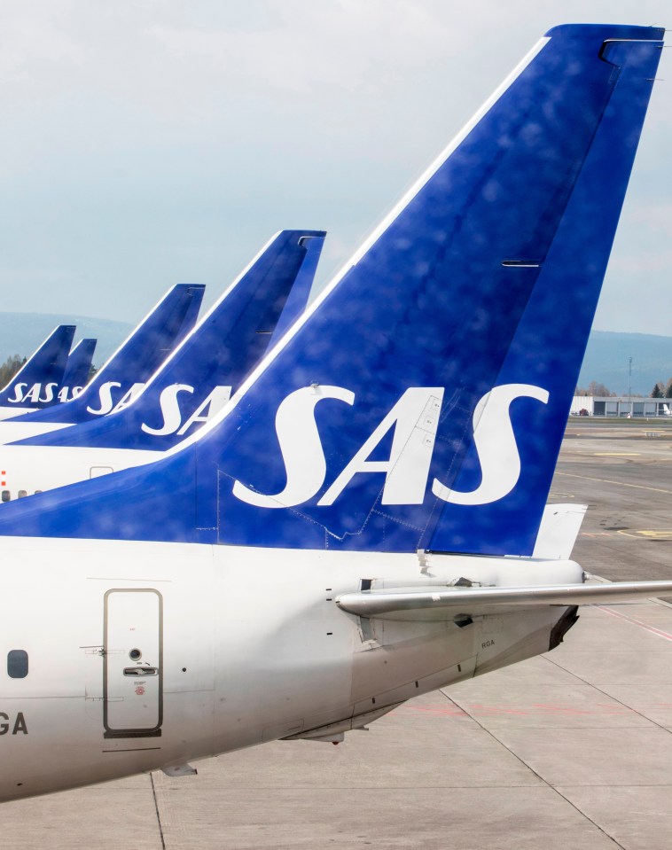 SAS airplanes parked at Gardamoen Airport during a pilot strike.