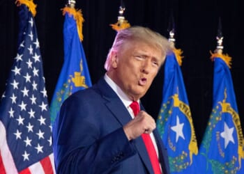 President Donald Trump pumps his fist at an event in Fervent Calvary Chapel Church in Las Vegas on July 8, 2023.