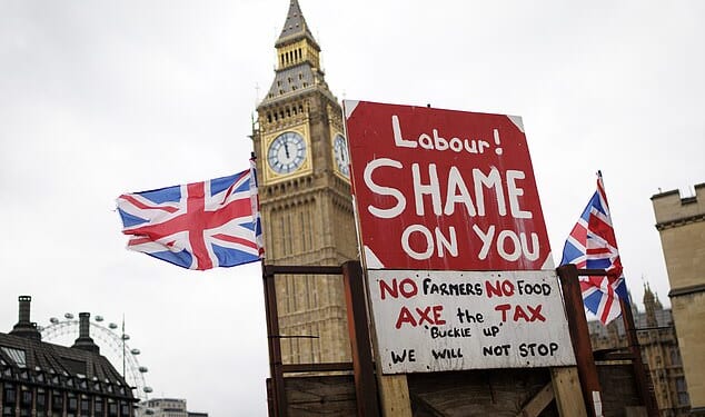 The results of the survey showed that 65 per cent of the public think the party 'unfairly neglects' those living in the countryside. Pictured: A placard at a farmers' protest in London earlier this month, against Labour's former changes to inheritance tax rules