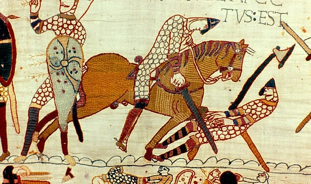 Part of the tapestry is the battle of Hastings, the death of Harold II last Anglo-Saxon king of England. Left, figure pulling arrow from eye and then being cut down by Norman knight. Armour Chain Mail Sword Axe Textile (October 1066)