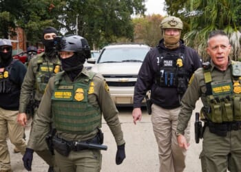 U.S. Chief Border Patrol Agent Gregory Bovino and other agents conduct an immigration enforcement operation in a neighborhood on Dec. 5, 2025, in New Orleans, Louisiana.