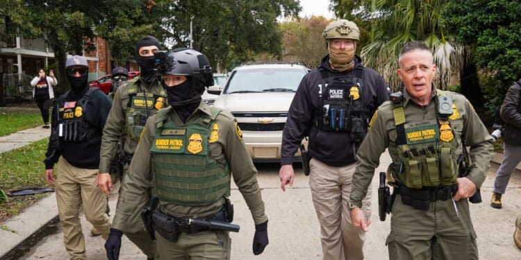 U.S. Chief Border Patrol Agent Gregory Bovino and other agents conduct an immigration enforcement operation in a neighborhood on Dec. 5, 2025, in New Orleans, Louisiana.