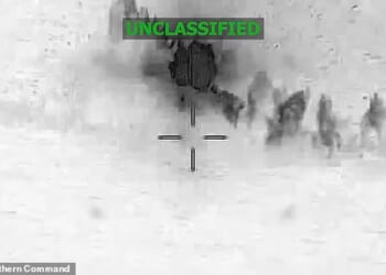 Extraordinary footage of the attack shows the moment the boat was blown up, sending thick plumes of smoke billowing into the air on the open waters