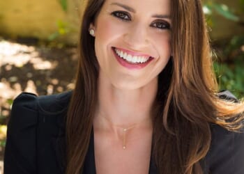 The decision by PR chief Meredith Maines (pictured) to step down from overseeing Archewell Philanthropies' communications has sparked a furious spin war