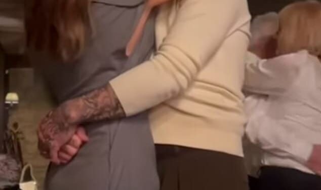 'We've got nothing to be sorry for': Victoria and David Beckham send a clear message to son Brooklyn amid feud as they dance to song with defiant lyrics while he remains in the US with wife Nicola