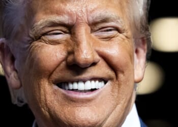 President Donald Trump smiles at a Heads of State and Government summit in The Hague on June 25, 2025.