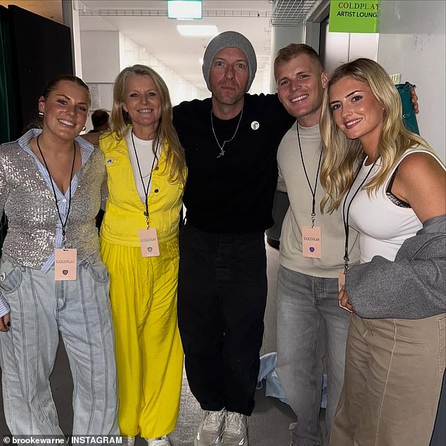 New Idea reports the children of cricket icon Shane Warne would 'love' to see their mother spark up a relationship with Coldplay frontman Chris Martin (Pictured from left: Brooke Warne, Simone Callaghan, Chris Martin, Jackson Warne, and Kiah Broadsmith)