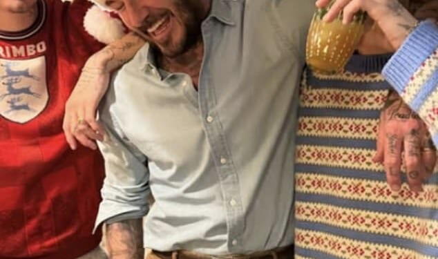 David Beckham and his sons Romeo and Cruz looked jolly as they donned Santa hats ahead of Christmas- as Brooklyn remains estranged from the family