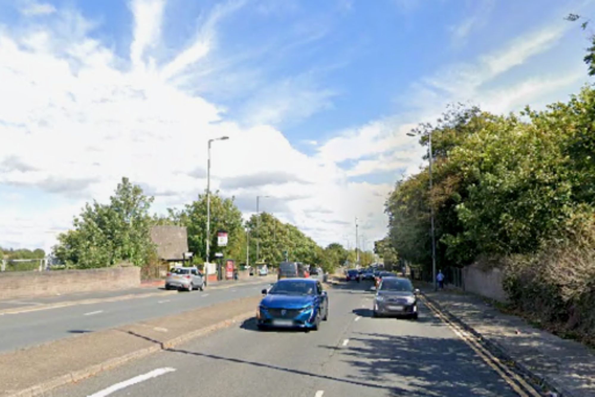 An image collage containing 1 images, Image 1 shows LOMGMOOR LANE with cars driving and trees lining the street