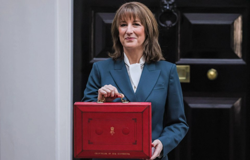 Rachel Reeves, Chancellor of the Exchequer, holding the red budget box outside 11 Downing Street.