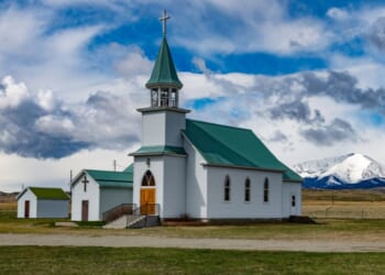 A picturesque church sits near the foot of Crazy Mountains outside of Big Timber, Montana.
