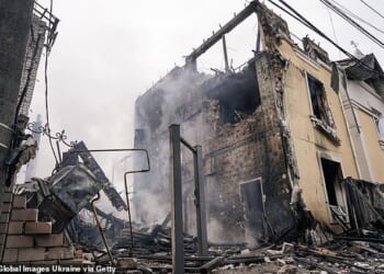 Natowas forced to scramble fighter jets as Vladimir Putin unleashed a missile and drone barrage on Ukrainejust hours before Zelenskywas due to meet Trumpin Floridafor talks on a US-brokered peace plan. Pictured: A private residential building in the Darnytskyi district of Kyiv
