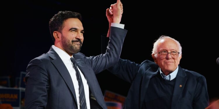 New York Mayor-elect Zohran Mamdani is seen in an Oct. 26 photo celebrating with Sen. Bernie Sanders, a socialist from Vermont. Mamdani announced Sanders and embattled New York Attorney General Letitia James will participate in his Jan. 1 swearing-in.