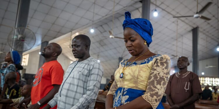 Roman Catholics pray at Saint Michael's Cathedral during the Sunday's service in Minna, Nigeria, on Nov. 30, 2025, for the safe return of the abducted students of Saint Mary's Catholic School earlier this month.