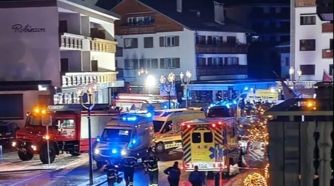 Partygoer describes moment fire engulfed Swiss ski resort bar as panicked revellers smashed windows to flee in stampede