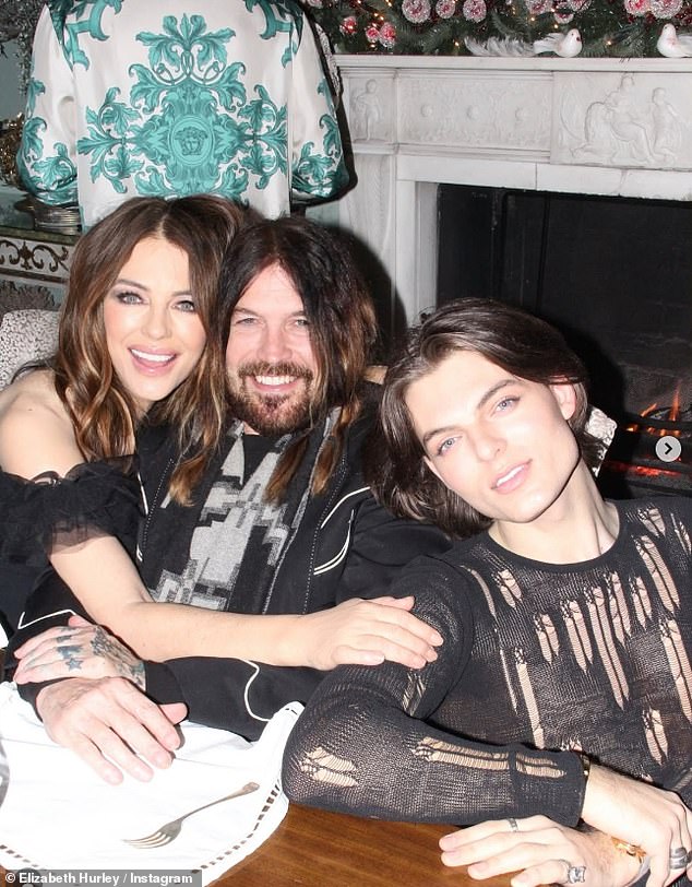 Elizabeth Hurley put on a loved-up display with boyfriend Billy as they joined her son Damian for a dinner by the fire
