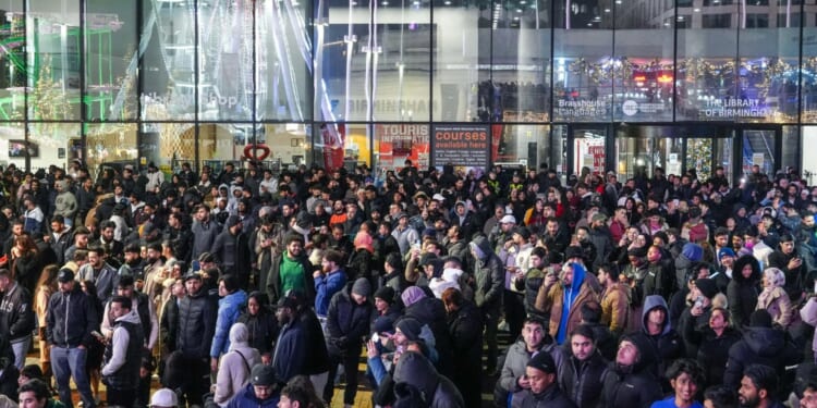 Hundreds of revellers turn up to fake New Year’s Eve fireworks for SECOND year in a row despite cops warning of no event