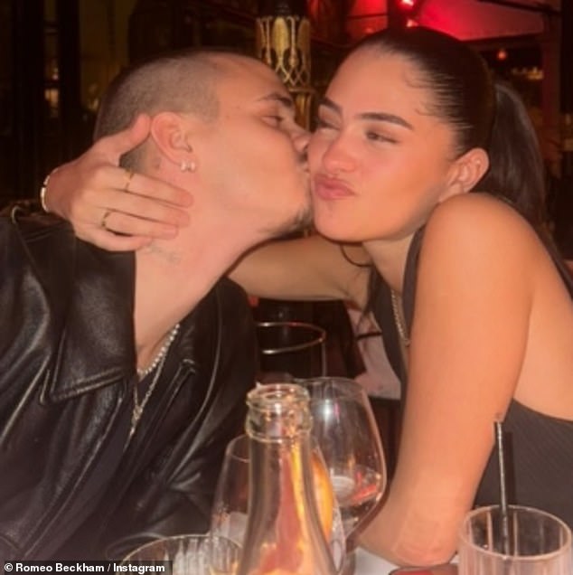 He cuddled up to his girlfriend Kim in a sweet snap