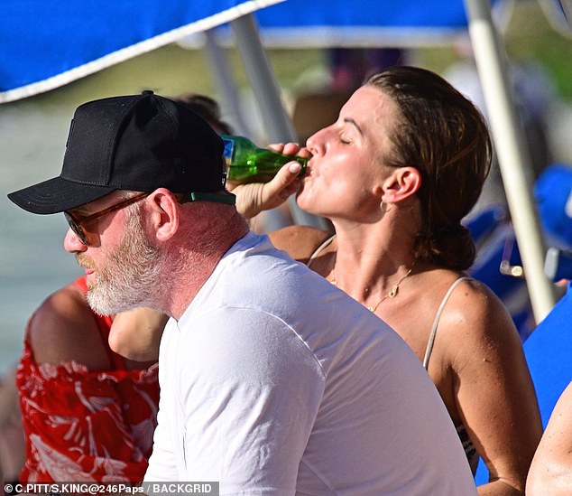 Coleen kicked back with a beer