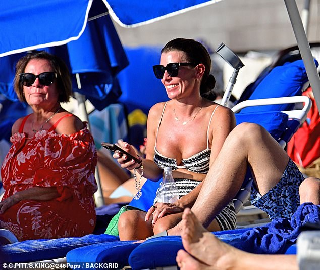 Coleen's parents Colette and Tony have also joined them on their family holiday as well as retired footballers and Wayne's former teammates Jonny, Michael Carrick and Darren Gibson