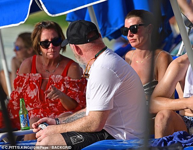 Wayne chatted away to Coleen's mum Colette