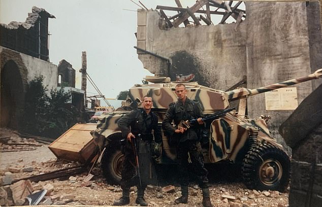 Two of Mike's fellow extras in front of a replica German Tiger Tank