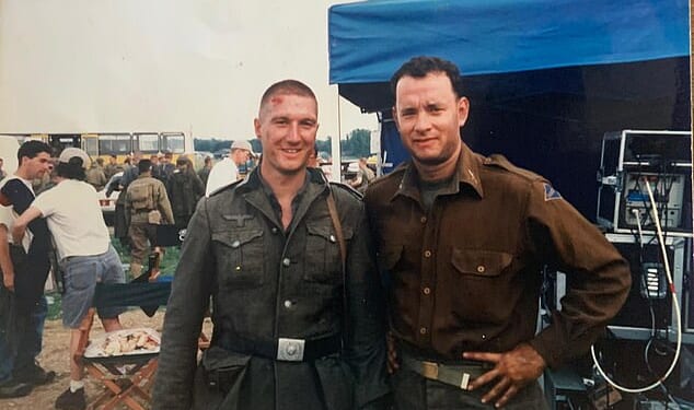 Tom Hanks, right, posing for a photo with Mike on his last day of filming