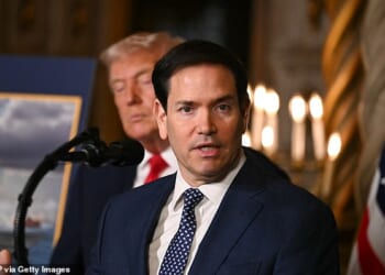 Secretary of State Marco Rubio (right) has become President Donald Trump's (left) most popular Cabinet member, including to the Daily Mail's late December poll